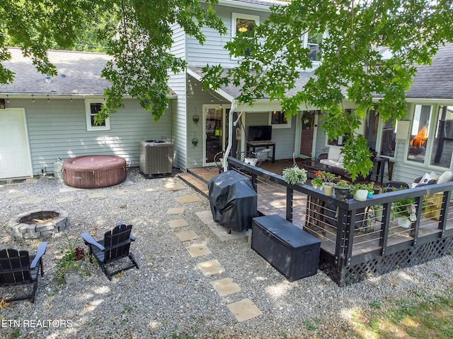 1839 Plumb Creek Cir, Knoxville, TN 37932 - view of patio / terrace featuring a hot tub, an outdoor fire pit, a grill, and a deck