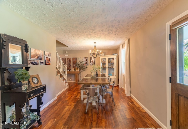 1839 Plumb Creek Cir, Knoxville, TN 37932 - dining area featuring stairway, a textured ceiling, a chandelier, and dark wood-style floors