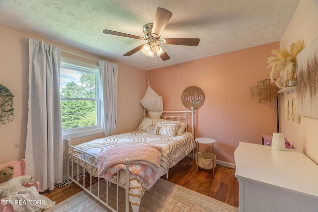 1839 Plumb Creek Cir, Knoxville, TN 37932 - bedroom with a textured ceiling, wood finished floors, and ceiling fan
