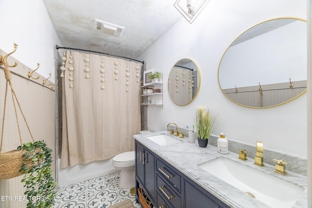 1839 Plumb Creek Cir, Knoxville, TN 37932 - full bath featuring double vanity, a textured ceiling, shower / bath combo, and tile patterned floors