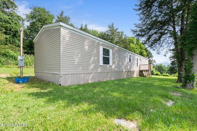 288 Forks Grove Rd, Lafollette, TN 37766 - view of side of property featuring a yard