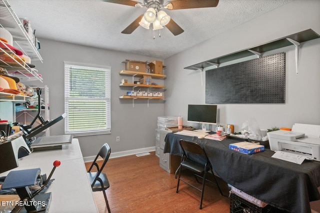 288 Forks Grove Rd, Lafollette, TN 37766 - office area with wood finished floors, a ceiling fan, and a textured ceiling
