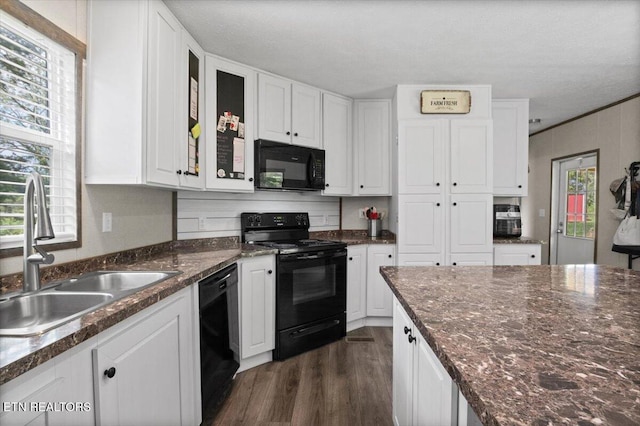 288 Forks Grove Rd, Lafollette, TN 37766 - kitchen with black appliances, dark wood-type flooring, white cabinetry, and healthy amount of natural light