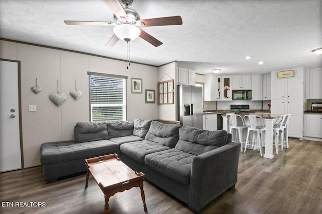 288 Forks Grove Rd, Lafollette, TN 37766 - living room with ceiling fan, a textured ceiling, wood finished floors, and recessed lighting