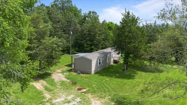 288 Forks Grove Rd, Lafollette, TN 37766 - aerial view of property and surrounding area with a forest