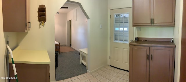 195 Hamblin St, New Tazewell, TN 37825 - doorway to outside featuring light tile patterned floors and baseboards