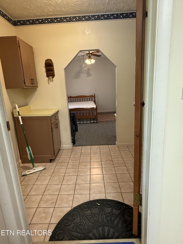 195 Hamblin St, New Tazewell, TN 37825 - corridor with light tile patterned floors and baseboards