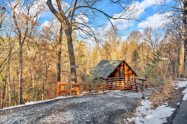 2784 Mountain View Cir, Sevierville, TN 37862 - view of front of house with a view of trees and roof with shingles