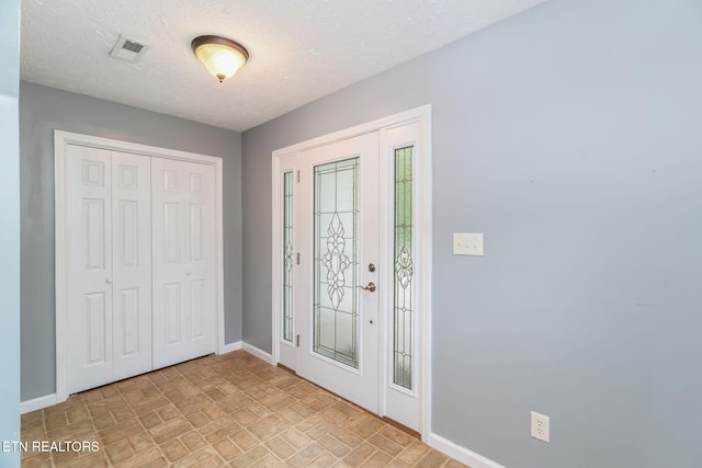 363 Staghorn Ln, Seymour, TN 37865 - foyer entrance featuring baseboards and a textured ceiling