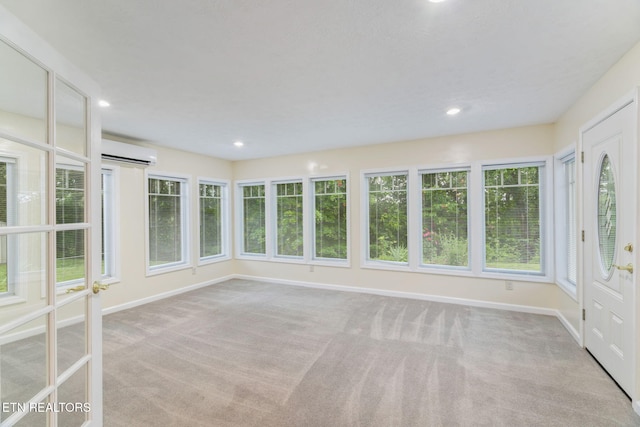 363 Staghorn Ln, Seymour, TN 37865 - unfurnished sunroom with a wall mounted AC, carpet flooring, and recessed lighting