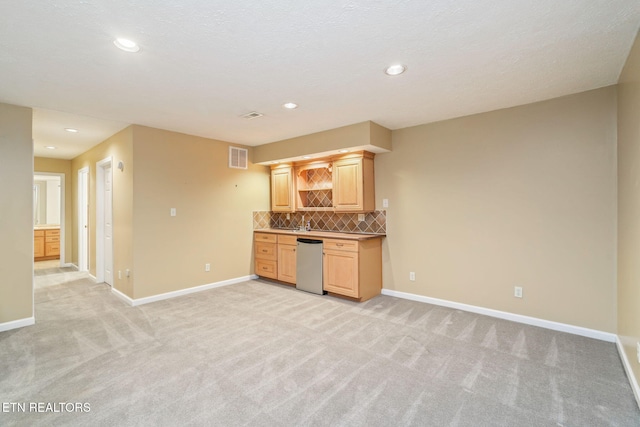 363 Staghorn Ln, Seymour, TN 37865 - kitchen featuring dishwasher, light colored carpet, decorative backsplash, light brown cabinetry, and open shelves