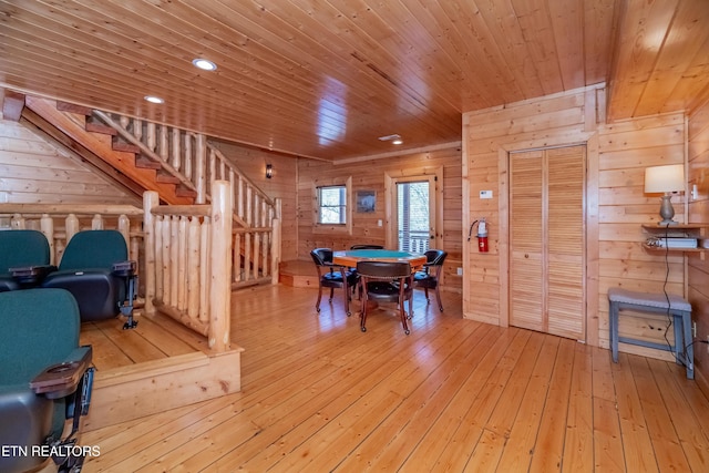 1032 Black Bear Cub Way, Sevierville, TN 37862 - dining room with stairs, wood walls, hardwood / wood-style flooring, wooden ceiling, and recessed lighting