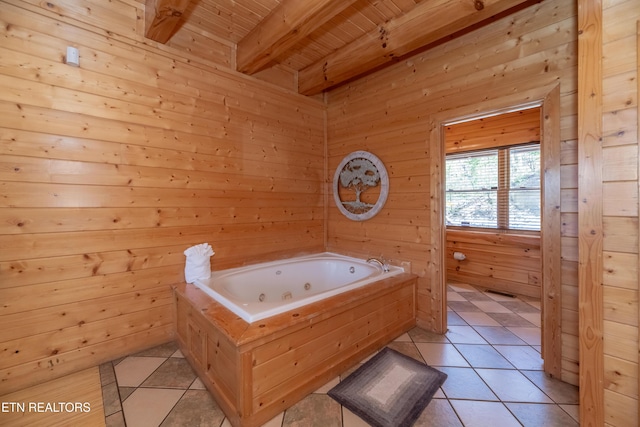 1032 Black Bear Cub Way, Sevierville, TN 37862 - bathroom with a wooden ceiling with exposed beams, tile patterned flooring, a whirlpool tub, and wood walls