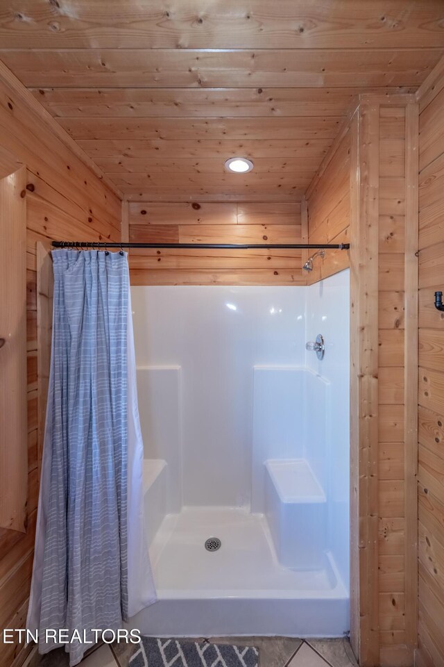 1032 Black Bear Cub Way, Sevierville, TN 37862 - full bathroom featuring wood ceiling, a shower with shower curtain, and wood walls