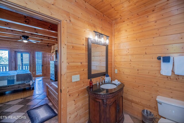 1032 Black Bear Cub Way, Sevierville, TN 37862 - full bath featuring wooden walls, vanity, a ceiling fan, a bathtub, and wooden ceiling
