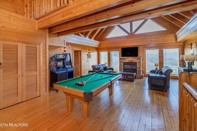 1032 Black Bear Cub Way, Sevierville, TN 37862 - game room featuring beamed ceiling, wooden walls, light wood-style floors, billiards table, and healthy amount of natural light