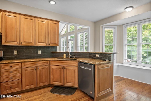171 Forest Cove Ct, Jacksboro, TN 37757 - kitchen featuring dishwasher, a peninsula, light wood-style floors, and healthy amount of natural light