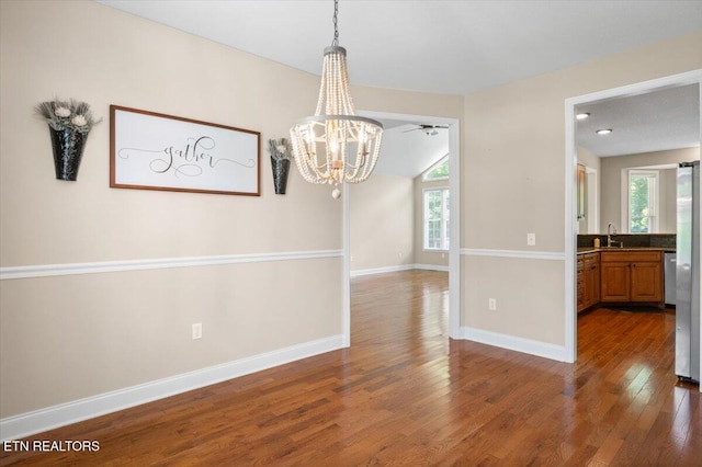 171 Forest Cove Ct, Jacksboro, TN 37757 - unfurnished dining area with wood finished floors and a chandelier