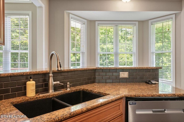 171 Forest Cove Ct, Jacksboro, TN 37757 - kitchen with dishwasher, backsplash, and light stone counters