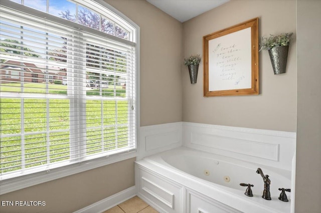 171 Forest Cove Ct, Jacksboro, TN 37757 - bathroom with a tub with jets and tile patterned floors