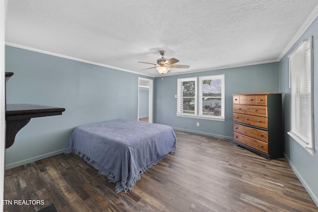 204 Queener St, Jacksboro, TN 37757 - bedroom with wood finished floors, a textured ceiling, ornamental molding, and ceiling fan