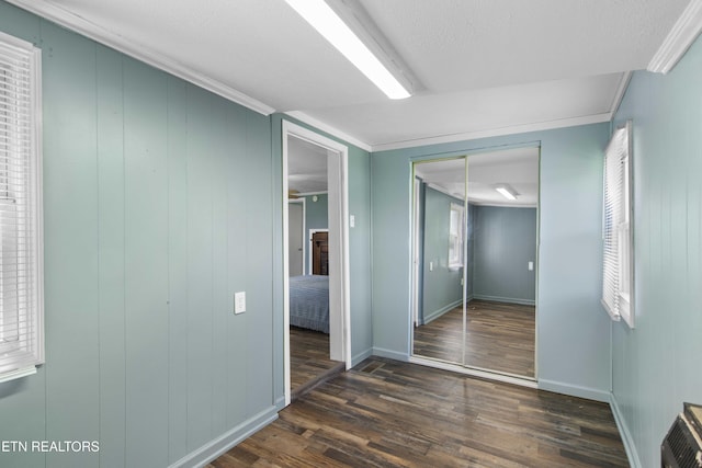 204 Queener St, Jacksboro, TN 37757 - hallway with dark wood-style floors and baseboards