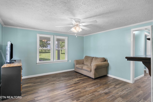 204 Queener St, Jacksboro, TN 37757 - sitting room with wood finished floors, ornamental molding, ceiling fan, and a textured ceiling