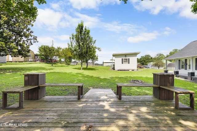 204 Queener St, Jacksboro, TN 37757 - deck featuring a lawn and an outdoor fire pit