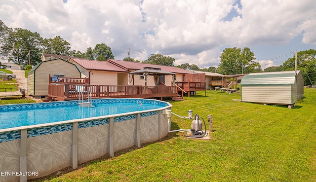 181 Overlook Ln, Jacksboro, TN 37757 - swimming pool featuring a wooden deck, a storage unit, a gazebo, and a yard