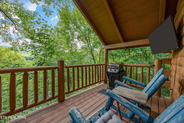 1235 Honeysuckle Ln, Sevierville, TN 37876 - wooden terrace with area for grilling