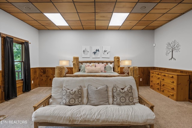 1235 Honeysuckle Ln, Sevierville, TN 37876 - bedroom featuring carpet, a wainscoted wall, and wooden walls