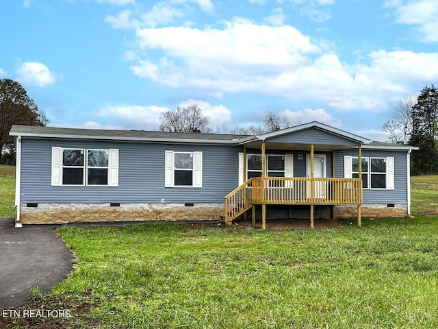 338 Bungalow Dr, Dandridge, TN 37725 - manufactured / mobile home featuring crawl space, covered porch, and a front yard