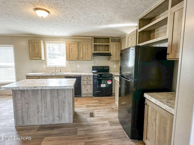 338 Bungalow Dr, Dandridge, TN 37725 - kitchen with open shelves, black appliances, light wood-style floors, a textured ceiling, and light countertops