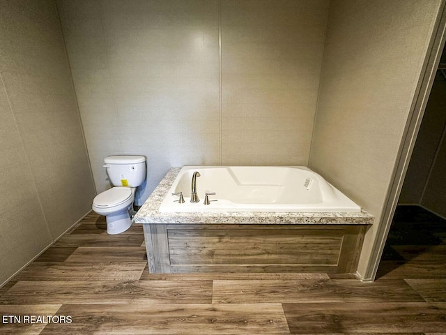 338 Bungalow Dr, Dandridge, TN 37725 - bathroom featuring wood finished floors and a bath