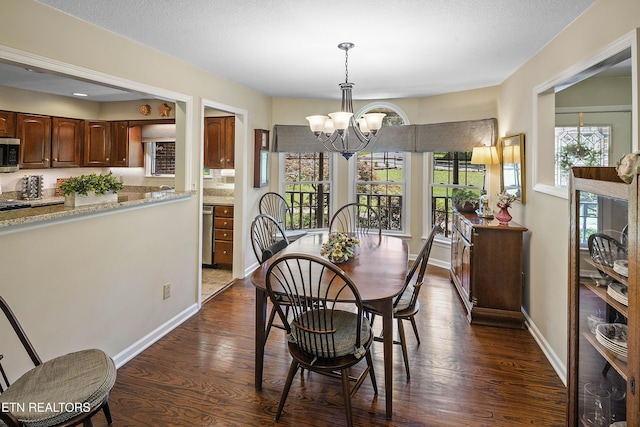302 Lake St, Harriman, TN 37748 - dining space featuring a chandelier, dark wood finished floors, and plenty of natural light