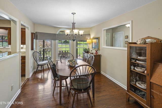 302 Lake St, Harriman, TN 37748 - dining space featuring dark wood-type flooring and a chandelier
