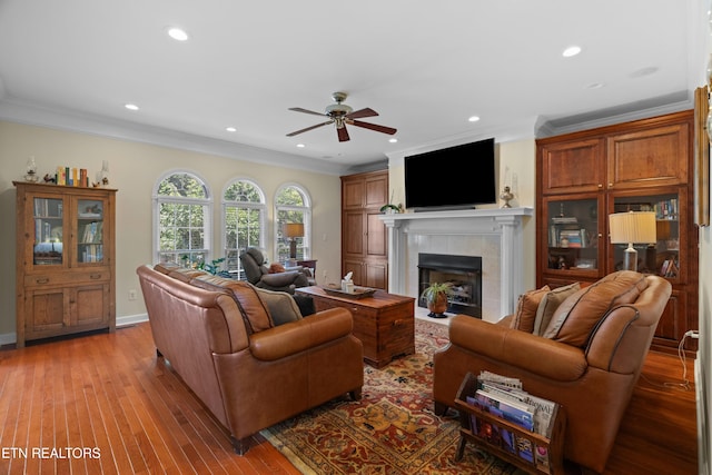 112 Reed Cir, Johnson City, TN 37601 - living area featuring ceiling fan, a fireplace, crown molding, recessed lighting, and light wood-type flooring