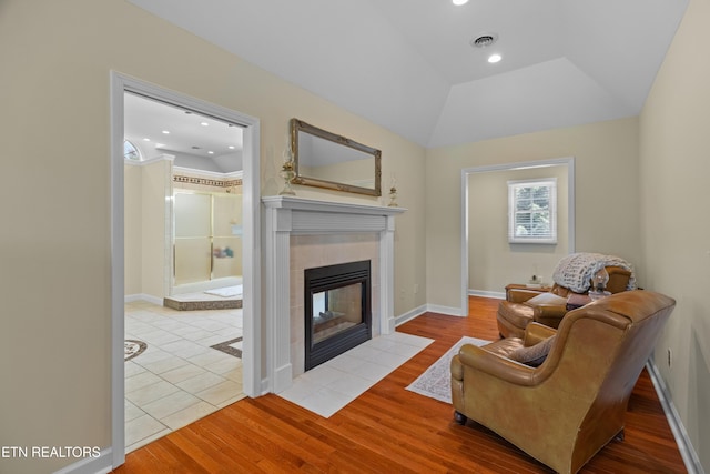 112 Reed Cir, Johnson City, TN 37601 - living room with a tile fireplace, wood finished floors, and recessed lighting
