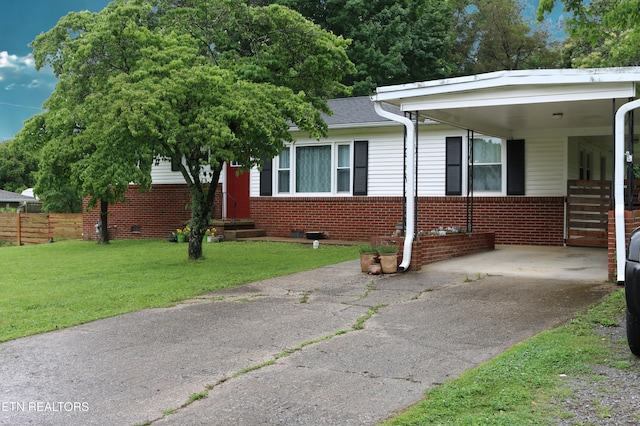 8025 Sharp Rd, Powell, TN 37849 - view of front facade with brick siding, driveway, a carport, and entry steps