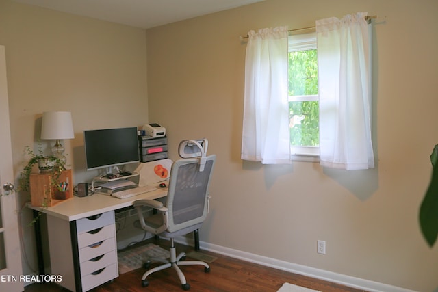 8025 Sharp Rd, Powell, TN 37849 - home office with dark wood finished floors and baseboards