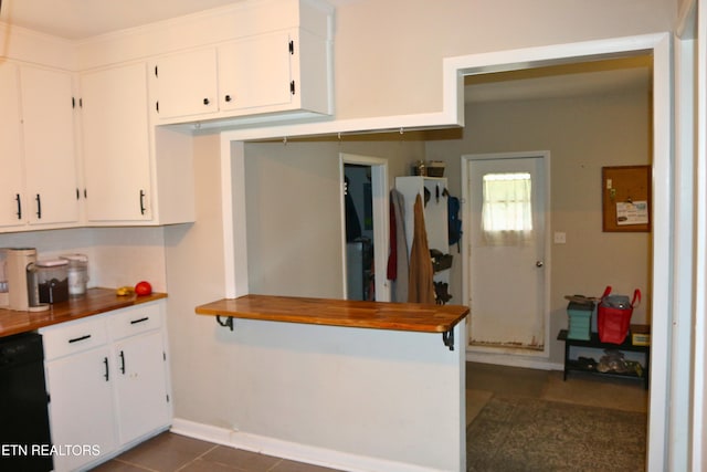 8025 Sharp Rd, Powell, TN 37849 - kitchen featuring white cabinetry, black dishwasher, and a peninsula