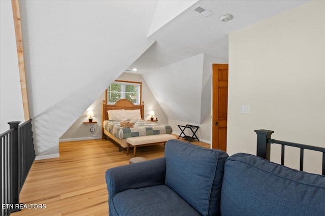 824 Deerfield Way, Lafollette, TN 37766 - bedroom featuring wood finished floors and lofted ceiling