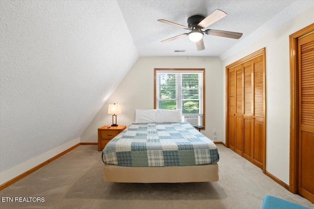 824 Deerfield Way, Lafollette, TN 37766 - bedroom with a textured ceiling, light carpet, lofted ceiling, a ceiling fan, and cooling unit