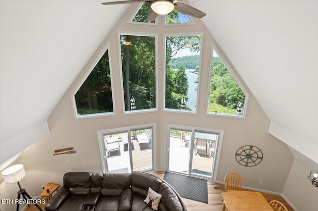824 Deerfield Way, Lafollette, TN 37766 - living room with high vaulted ceiling, a ceiling fan, healthy amount of natural light, and wood finished floors