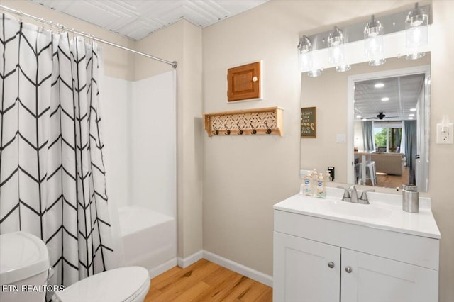 824 Deerfield Way, Lafollette, TN 37766 - bathroom with wood finished floors, vanity, and shower / tub combo with curtain