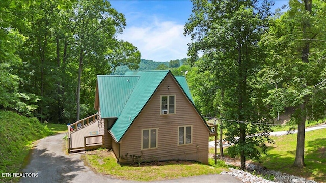 824 Deerfield Way, Lafollette, TN 37766 - view of home's exterior with asphalt driveway and a metal roof