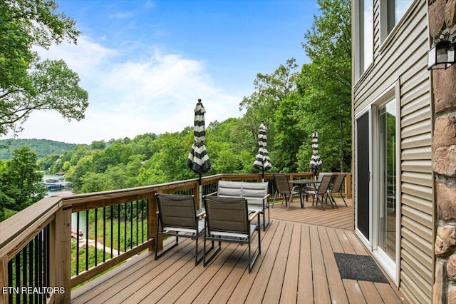 824 Deerfield Way, Lafollette, TN 37766 - deck featuring outdoor dining area