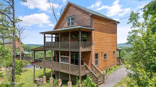 3169 Bear Mountain Ln, Sevierville, TN 37876 - rear view of property with a wooden deck and a balcony