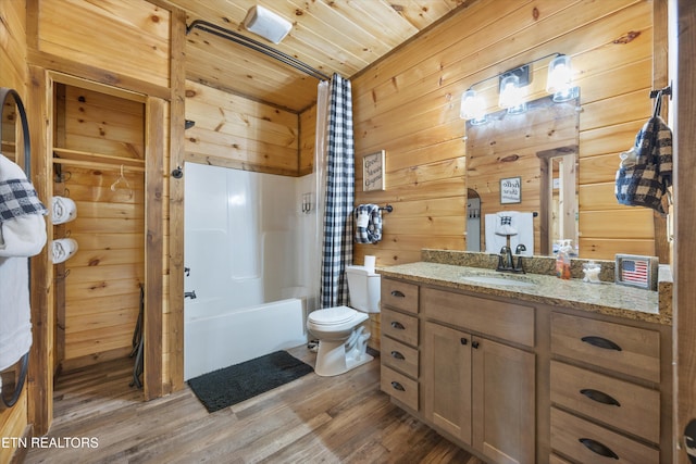 3169 Bear Mountain Ln, Sevierville, TN 37876 - bathroom with wood walls, wood finished floors, wood ceiling, shower / tub combo, and vanity