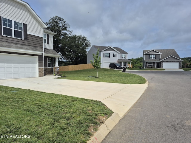 7515 Grasshopper Ln, Corryton, TN 37721 - view of yard with driveway and a garage